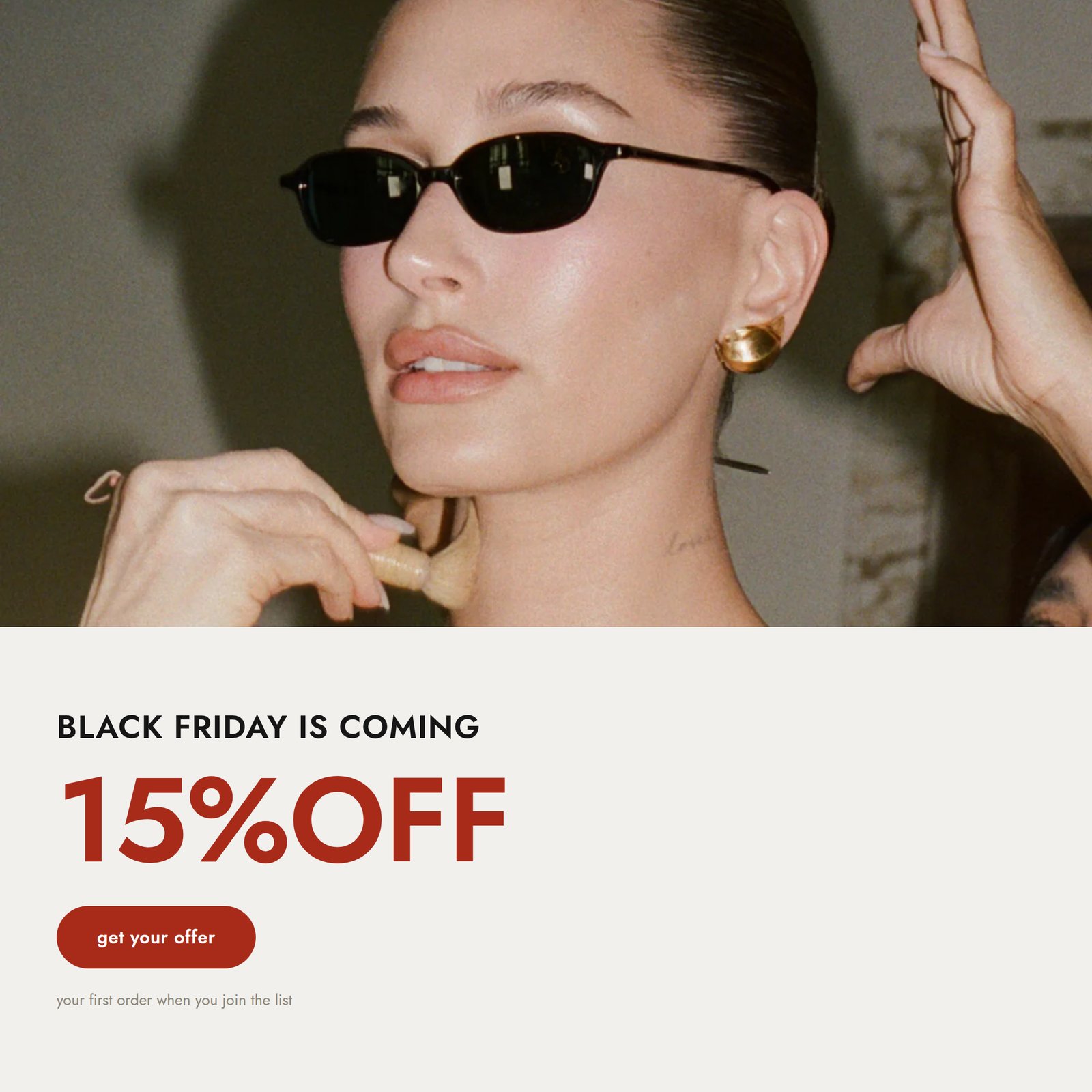 Square ad with a close up product photo on top and a cream card below reading Black Friday is coming, 15 percent off in red, and a get your offer button