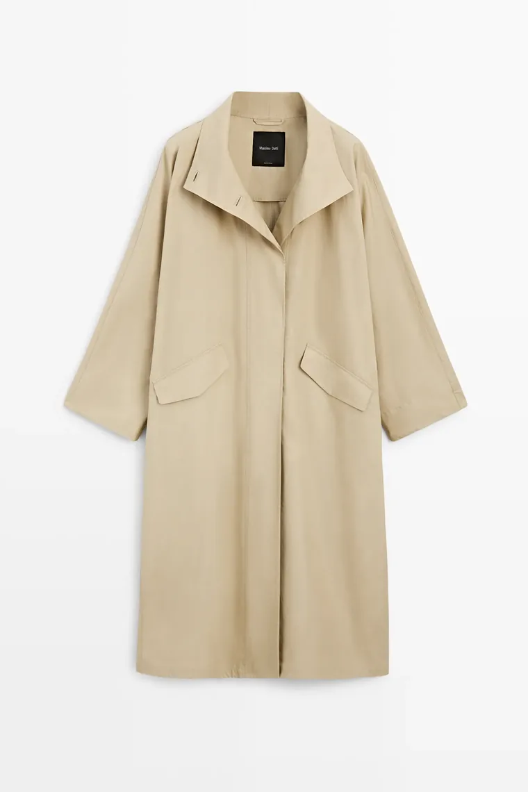 Sand-colored long oversized coat with broad folded lapels and flap pockets