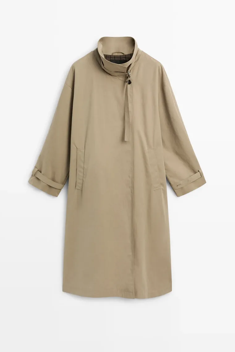 Khaki long coat with an upright funnel collar, throat strap and cuff straps