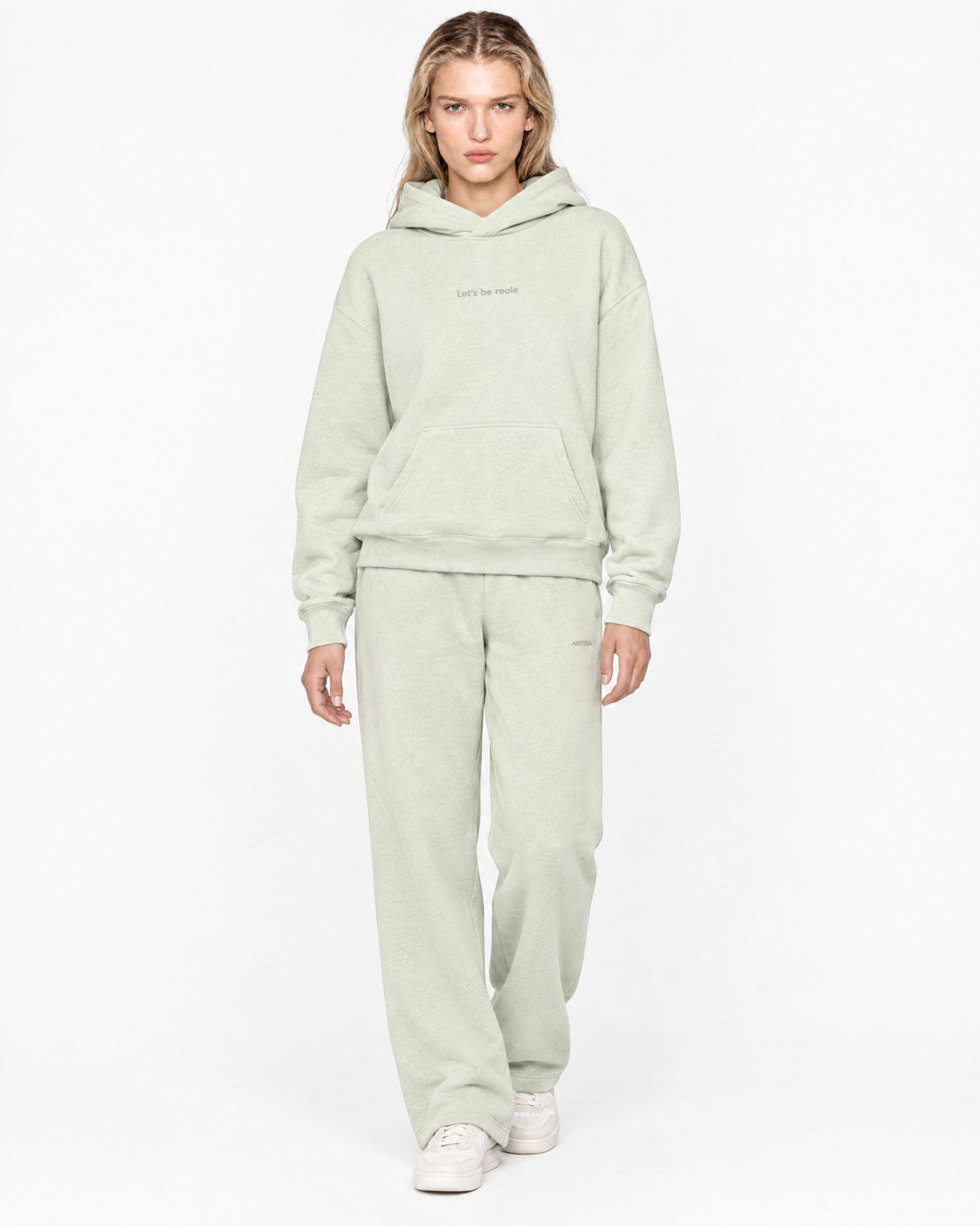 The hoodie set. Imaginary AI-generated Aritzia x Reale Actives campaign.