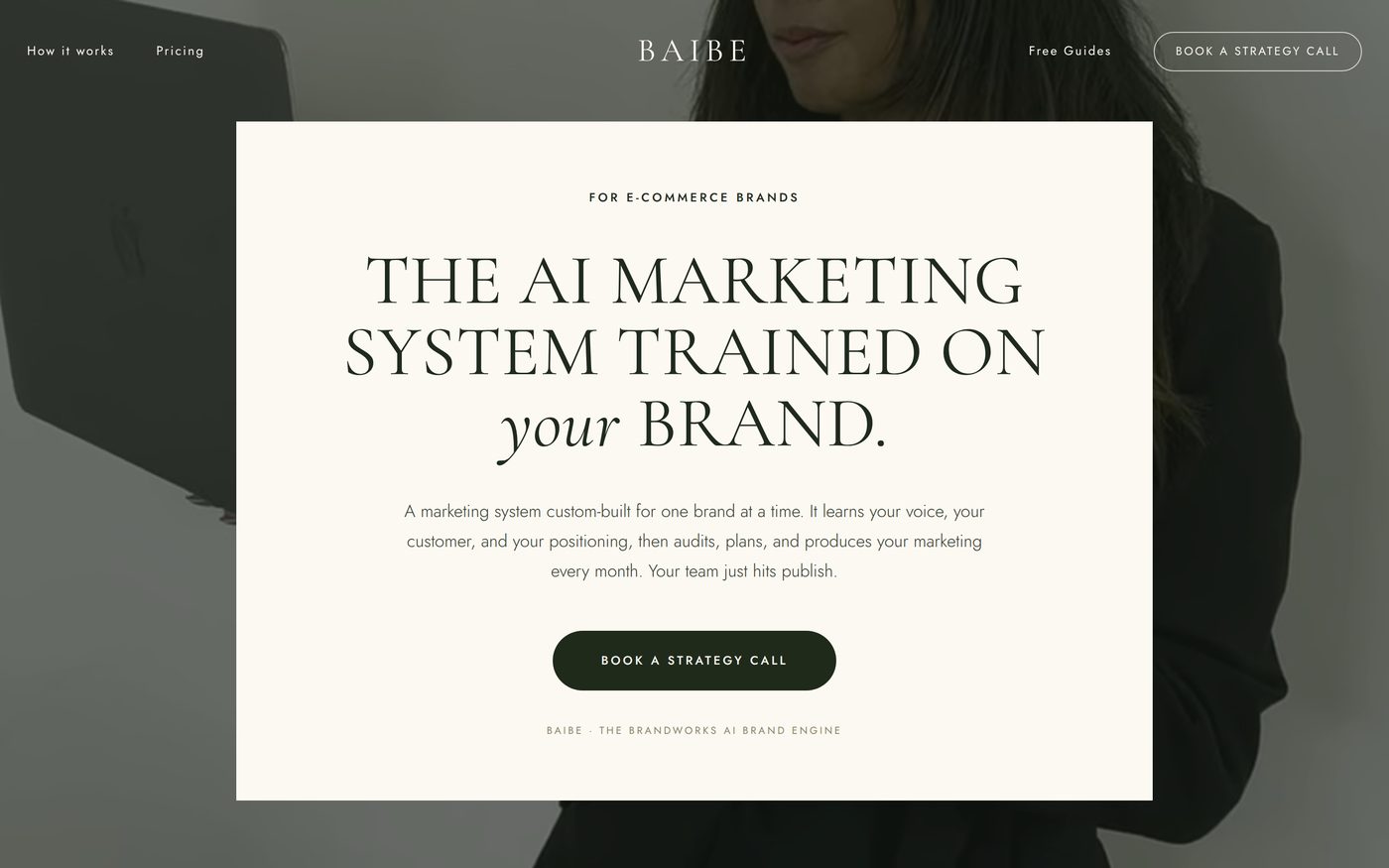 A landing page banner with a video playing behind a floating ivory card, a centered wordmark and a large serif headline